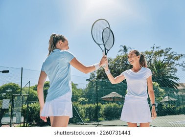 Tennis, racket high five and women teamwork for sport game outdoor for exercise and fitness. Sports achievement, winner and happy athlete partner team feeling success from workout goals on court - Powered by Shutterstock