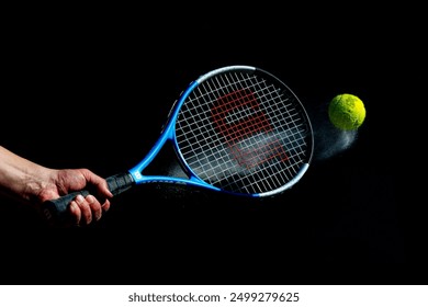 Tennis Racket hitting a Tennis ball - Powered by Shutterstock