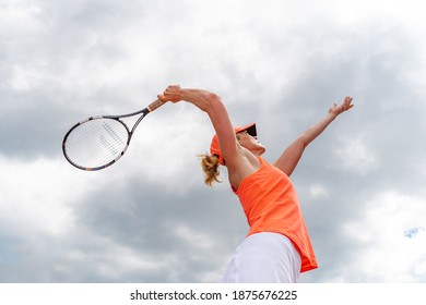 Tennis Serve By A Young Woman In A Tournament