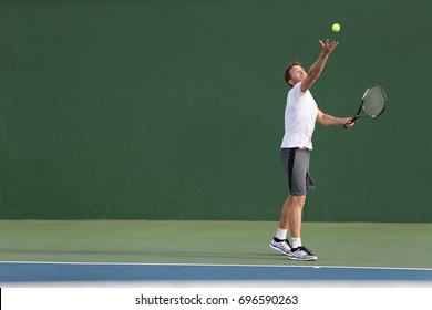 Tennis Serve Player Man Serving Ball Stock Photo 696590263 | Shutterstock