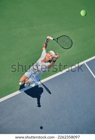 Tennis serve, sport and woman on outdoor court, fitness motivation and competition with athlete training for game. Workout, healthy and player on turf, active with exercise and sports action top view