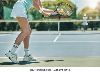 Tennis serve, sports and woman with legs on outdoor court, fitness motivation and competition with athlete training. Workout, healthy and player on turf, active with sport and exercise with action - Powered by Shutterstock