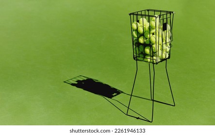 Tennis, sport ball basket of sports field on a green training court outdoor with no people. Exercise, fitness and workout equipment shadow for match of game competition on turf ground with mockup - Powered by Shutterstock