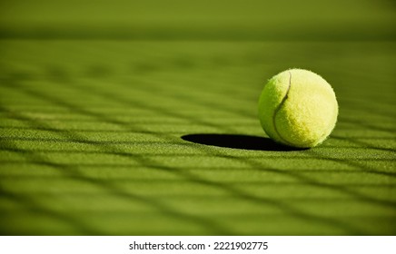 Tennis, sport and fitness with tennis ball on turf with green closeup and texture, sports match and competition. Training, active and ball on tennis court, outdoor tournament and competitive game. - Powered by Shutterstock