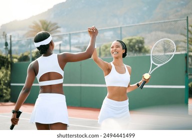 Tennis, sports and women celebrate on court for exercise, training and workout for practice, competition and match. Fitness, friends and people holding hands for bonding, fun and winning outdoors - Powered by Shutterstock