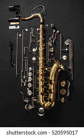 Tenor Saxophone, Exploded View Drawing Isolated On Gray Background.
Exploded Diagram Of Tenor Saxophone. Key Action Of Instrument.
