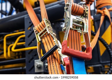 Tension Safety Belts With Mechanical Locks. Stretch Textile Slings Hold The Load
