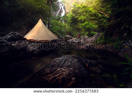 Tent and camping with Klonglan water fall in Khlong Lan National Park in Kamphaeng Phet near Chiang mai, Thailand, un seen travel point for camping and relax in holiday