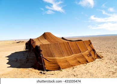 Tent In  The Desert Of Morocco Sahara And Rock  Stone    Sky