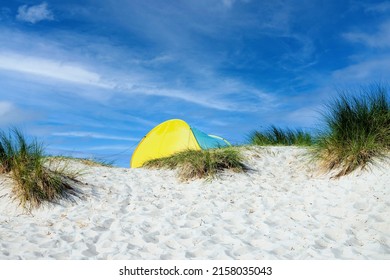 A tent in the dunes on the Baltic Sea beach near Warnemuende (Rostock).