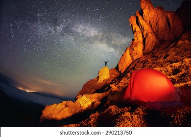 Tent And The Milky Way. Artistic Lighting Unreal Mountain Scenery While Rock Climbing In The Wild Mountains Provides A Unique Fantastic Effect Unearthly Planets With Fabulous Landscapes Of Mars