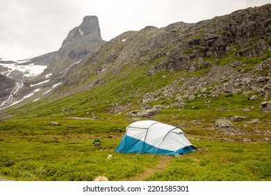 Tent On A Lawn In The Valley Of Litlefjellet, Mountains With Snow Around, Family Wild Camping In The Valley Summertime