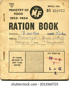 TENTERDEN, ENGLAND - JULY 23, 2021: A British food ration coupon book. Introduced in 1940 during the Second World War, rationing was ended in 1954.