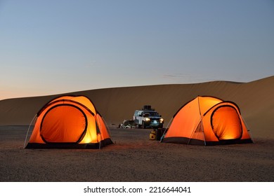 Tents in the Nubian Desert in the evening light, near Dongola, Northern State, Nubia, Sudan - Shutterstock ID 2216644041