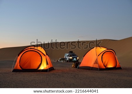 Tents in the Nubian Desert in the evening light, near Dongola, Northern State, Nubia, Sudan