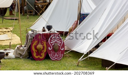 Tents and Various Objects and Equipment in an Ancient Celtic Encampment