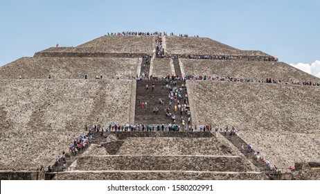 Teotihuacan, Mexico - April 10, 2017: Crowd Of Tourists Queuing To Climb The Pyramid Of The Sun At The Teotihuacan Archaeological Site Located About 40 Km From Mexico City.