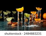 Tequila with lime and salt and tequila with orange and cinnamon.