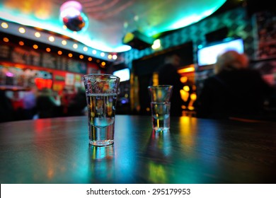 Tequila In Shot Glasses On The Table In A Nightclub. Selective Focus