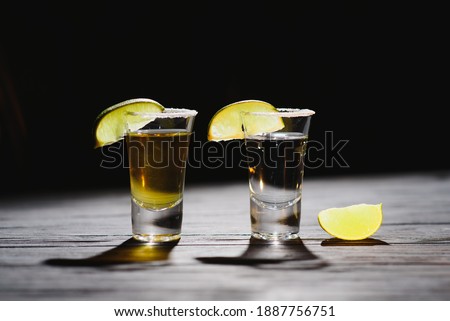 Tequila shot with lime . Selective focus