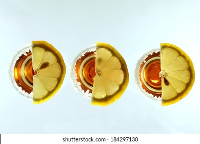 Tequila Shots With Lemon Slices, Top View, Isolated On White Background