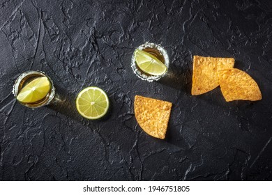 Tequila Shots With Lime Slices And Nacho Chips, Overhead Flat Lay Shot