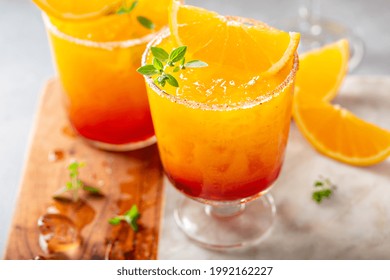 Tequila Sunrise Margarita Cocktail In Different Glasses With Ice, Refreshing Summer Drink