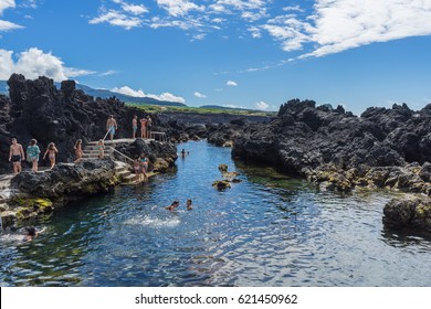 TERCEIRA, AZORES - AUGUST 1, 2016: People Swimming And Enjoying Summer In Natural Lava Swimming Pools Near Biscoitos