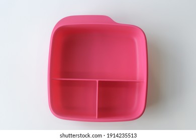 Terengganu, Malaysia - JANUARY 5 2021 . Top View Of Tupperware Lunch Box With A White Background Along With A Blank For Writing. Tupperware Product Is An American Brand. Keep Dry. Plastic Container.