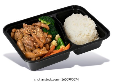 Teriyaki Chicken with Steamed Rice in Takeaway Box on White Background. Asian Food. Delivery Food. Clipping Path on the main object (not the shadow) Included.