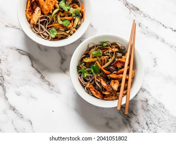 Teriyaki Chicken, Stir Fry Seasonal Autumn Vegetables With Soba Noodles On A Light Background, Top View