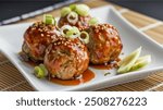 Teriyaki Meatballs: Juicy meatballs glazed with a sweet and savory teriyaki sauce, served over rice or noodles, or as a tasty appetizer at parties.