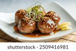 Teriyaki Meatballs: Juicy meatballs glazed with a sweet and savory teriyaki sauce, served over rice or noodles, or as a tasty appetizer at parties.