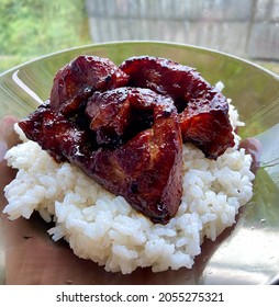 Teriyaki Pork With Rice On A Plate