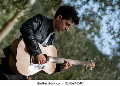 stylish boy with guitar hd