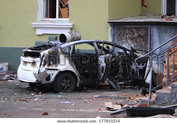 TERNOPIL, UKRAINE- FEBRUARY 18: Result of assault\
of city police department by activists Ukrainian revolution on\
February 18, 2014 in Ternopil, Ukraine. Protestants burned police\
department and cars.