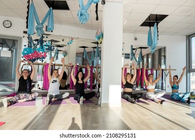 Ternopil, Ukraine - January 26, 2020: Group Pretty Woman Doing Stretching Exercises At Barre In A Yoga Fitness Class. Sport For Health Life