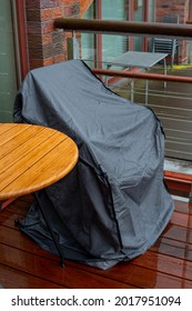 Terrace Furniture Cover Protecting Outdoor Furniture From Rain. Rainy Day.