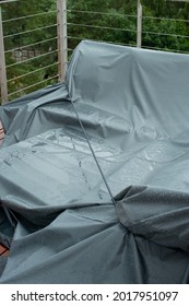 Terrace Furniture Cover Protecting Outdoor Furniture From Rain. Rainy Day.