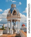 Terrace view with cloudscape, Cienfuegos, Cuba. Viewpoint from terrace of the Palace on government building. Palacio Ferrer in Jose Marti Park, House Of The Culture Benjamin Duarte. Cienfuegos, Cuba.