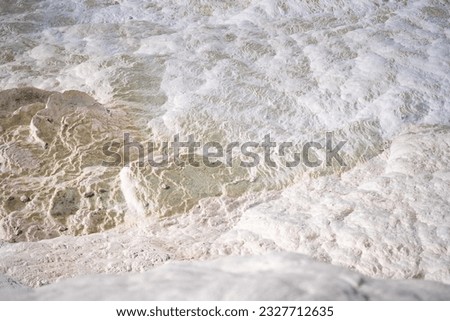 Similar – Foto Bild Luftaufnahme Panoramadrohne Blick auf den blauen Ozean Wellen, die am Sandstrand in Portugal erdrücken.