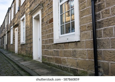 Terraced Houses In A Cobbled Street In Northern England