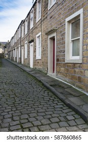 Terraced Houses In A Cobbled Street In Northern England