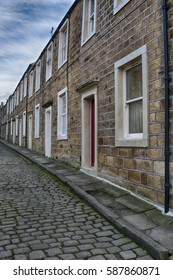 Terraced Houses In A Cobbled Street In Northern England