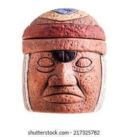 A Terracotta Olmec Face Idol Souvenir Isolated Over A White Background