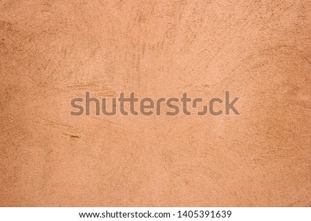 Terracotta plaster wall texture detailed close up