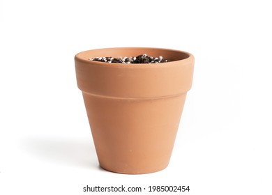 Terracotta Pot With Porous Soil Mixture In Isolated White Background. 