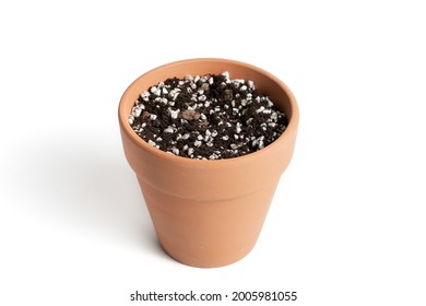 Terracotta Pot With Porous Soil Mixture In Isolated White Background. 