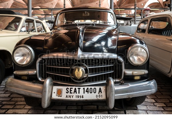 Terrassa, Cataluna Espana, Abril 9 2022:  Seat\
1400, The collection of automobiles, trucks, engines,  and bicycles\
on display at the MNACTEC plots a course through the history of\
transport.
