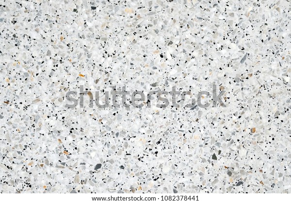 Terrazzo polished stone floor and wall pattern\
and color surface marble and granite stone, material for decoration\
background texture, interior\
design.